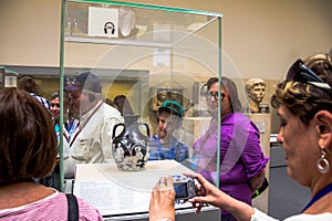 Visitors look at the Roman Portland Vase. British museum. London, UK