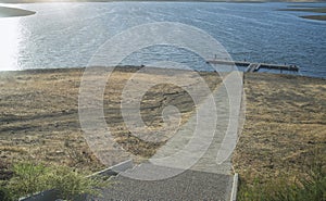 Visitors over reservoir pontoon