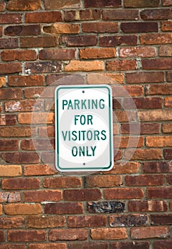 Visitors parking sign