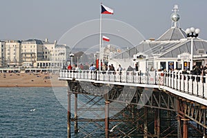 Visitors at the pier in Brighton , UK
