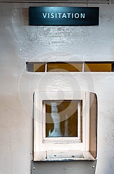 Visitors room in Alcatraz Prison. The visiting window to talk to prisoners, San Francisco California USA, March 30, 2020