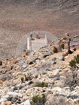 Visitors on the viewing platform of Meteor Crater in Arizona