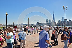 Visitors are waiting at Liberty State Park for Statue Cruises to visit Lady Liberty and Immigration Museum on Ellis Island