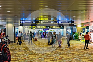 Visitors walk around Departure Hall in Changi Airport Singapore