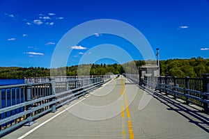 Visitors walking on top of the New Croton Dam.