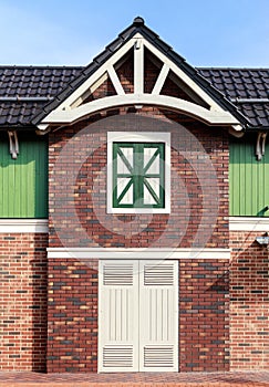 Visor on the building. Window with a wooden casement. Fragment of the building. White wooden door. Roof with metal tile