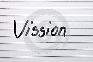 Vission, handwriting text on page of office agenda. Copy space