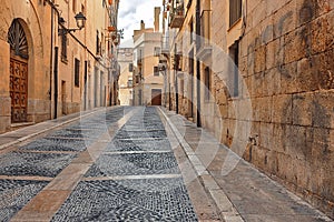 Vista street with gray pavement bridge of ancient Spain city Tarragona on the Mediterranean coast