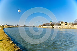 Vistula boulevards with flying balloon and St. Sta