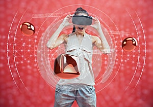 Visual reality concept. Young man using Visual reality or VR headset and interacting with object.