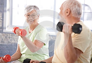 Vital senior couple in the gym