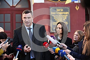 Vitali Klitschko tallking to journalist after vote in Kiev, Uktr