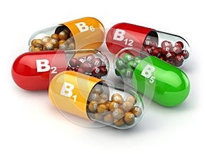 Vitamin B. Capsules B1 B2 B6 B12 on white background.