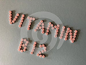 Vitamin B12, word in pills, banner heading