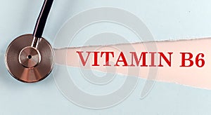 VITAMIN B6 word made on torn paper, medical concept background