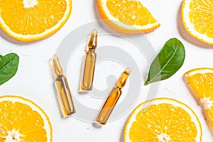 Vitamin C. Cosmetic products and fresh citrus fruits.