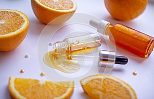 Vitamin C face skin care cosmetic concept - organic serum