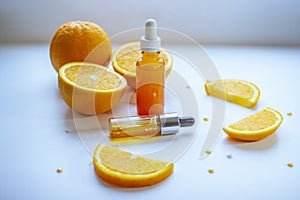 Vitamin C face skin care cosmetic concept - organic serum