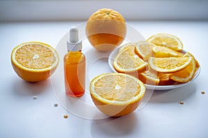 Vitamin C face skin care cosmetic concept - organic serum