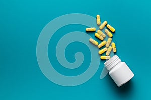 Vitamin capsules. Vitamin C pills and pill bottle