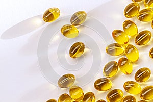 Vitamin D or cholecalciferol in olive oil capsules on the white background