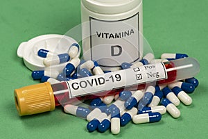 Vitamin D container with capsules around
