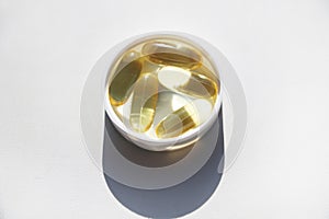 Vitamin D or omega 3 in gel capsules