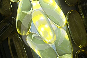 Pill supplements on a light and dark tray