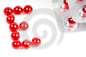 Vitamin e capsules letter E and blister packs