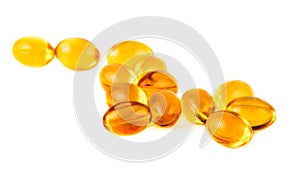 Vitamin E capsules on white