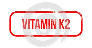 Vitamin K2 - red grunge rubber, stamp