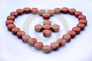 Vitamin medicine take dally health risk disease red pills