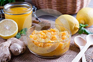 Vitamin mix ginger,lemon,honey and cinnamon in a vintage glass jar