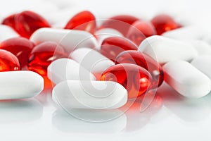 Vitamin pills: Red capsules and white tabs