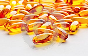 Vitamins, dietary supplement, the tablets Omega 3 cod-liver oil close up on a light background