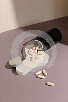 dietary supplements on neutral background