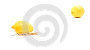 Vitamins are important for immunity. Thermometer with lemon.