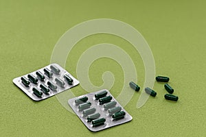 Vitamins and pills blister packs, close-up
