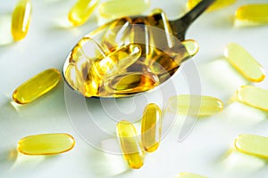 Vitamins supplements, fish oil in yellow capsules omega 3.