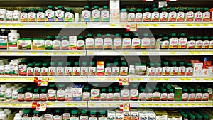 Vitamins and supplements on shelves