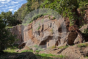 Viterbo, Lazio, Italy: Etruscan necropolis of Castel d`Asso, the facade and the entrance of the ancient tombs carved in the rock