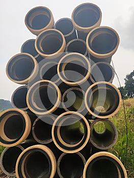 Vitrified clay pipe stacked at the construction site.