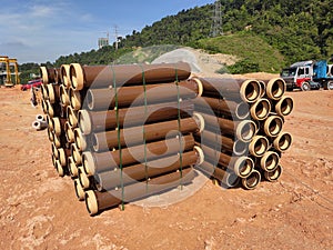 Vitrified clay pipe stacked at the construction site.