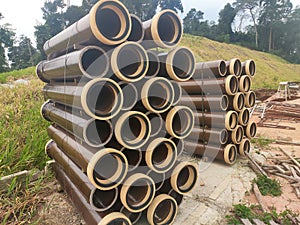 Vitrified clay pipe stacked at the construction site.