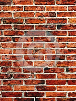 Vitrified rustic brick wall tile pattern as background. Scandinavian architecture style detail from Halmstad photo