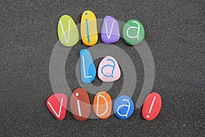 Viva la vida, spanish logo composed with colored stones