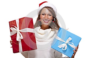 Vivacious woman in a Santa hat celebrating Xmas