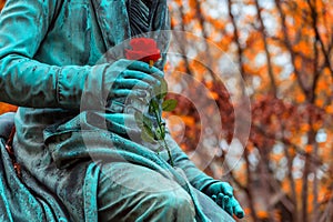 Vivant Denon, monument with a rose flower in the famous cemetery Paris Pere Lachaise, France. Golden autumn over eldest photo