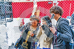 Vivianne Robinson, a big fan of Oscars ceremonies,  poses for tourists and photographers near the red carpet area on Hollywood Blv