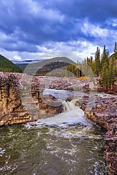 Vivid Cloudscape Over Elbow Falls